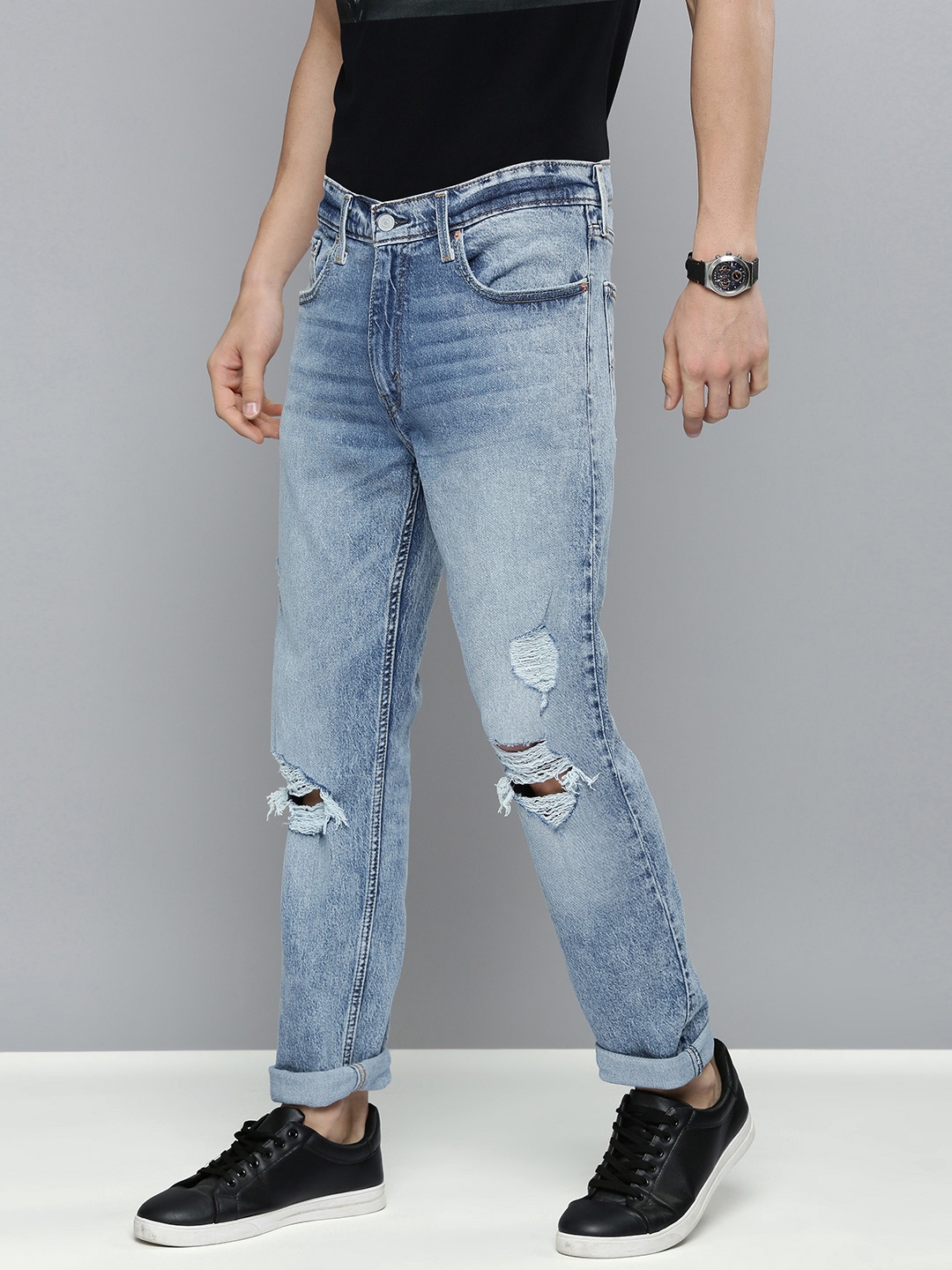 

Levis Men Blue Slim Tapered Fit Mildly Distressed Heavy Fade Stretchable Jeans