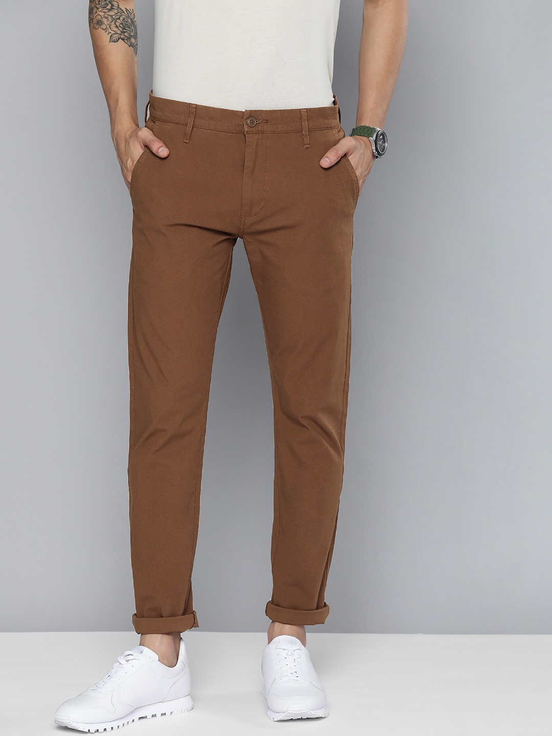 

Levis Men Brown Solid Mid Rise Slim Fit Casual Chinos Trousers