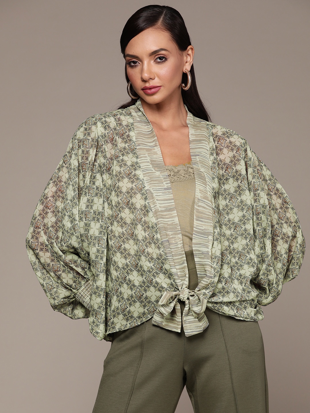 

aarke Ritu Kumar Green & Purple Georgette Top with Shrug & Camisole