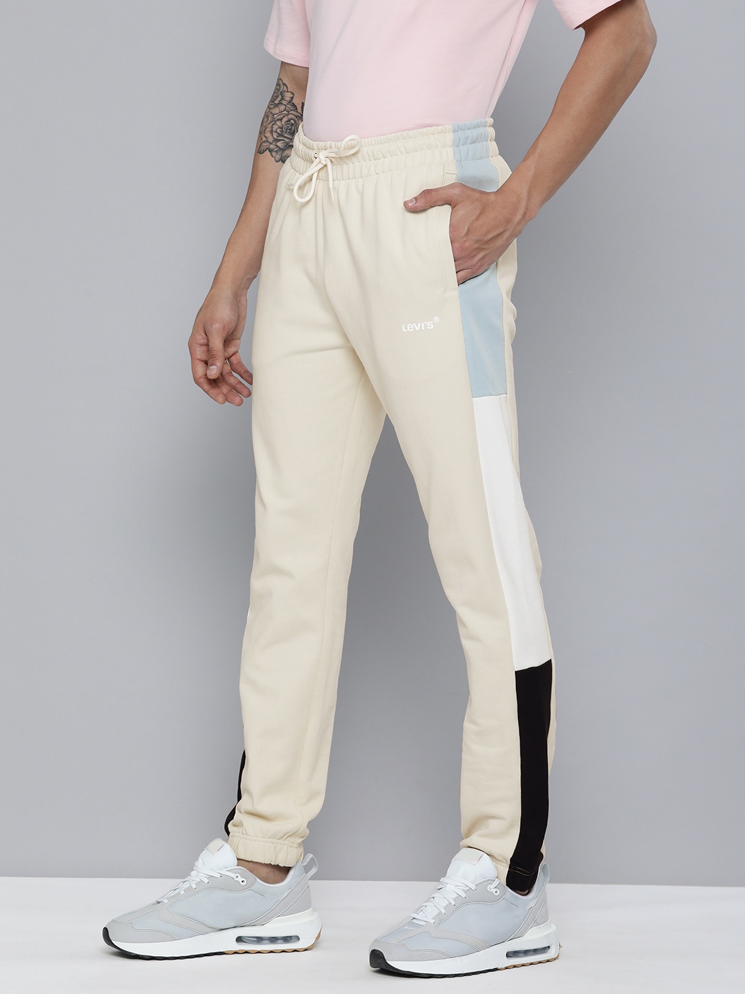 

Levis Men Cream-Coloured Solid Mid-Rise Pure Cotton Joggers With Side Stripes