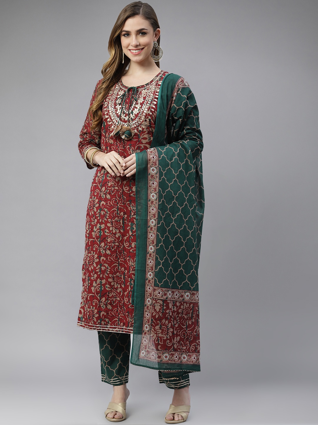 

Ishin Women Maroon Floral Yoke Design Gotta Patti Kurta with Trousers & With Dupatta