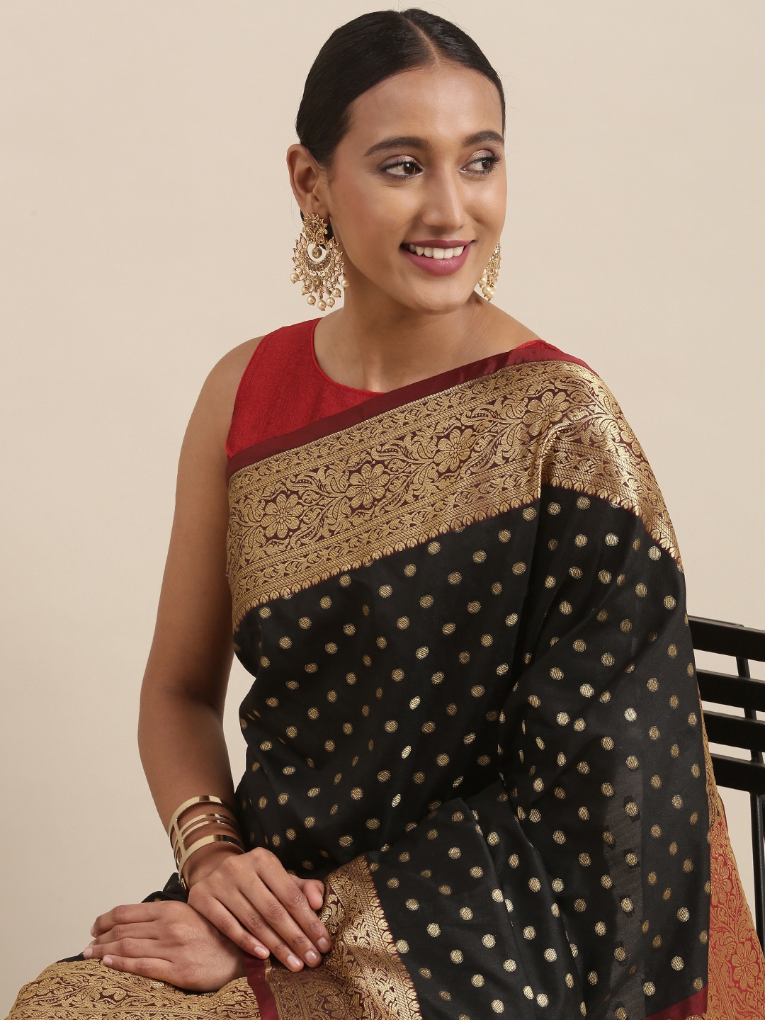 

Mitera Black & Golden Ethnic Motifs Banarasi Saree
