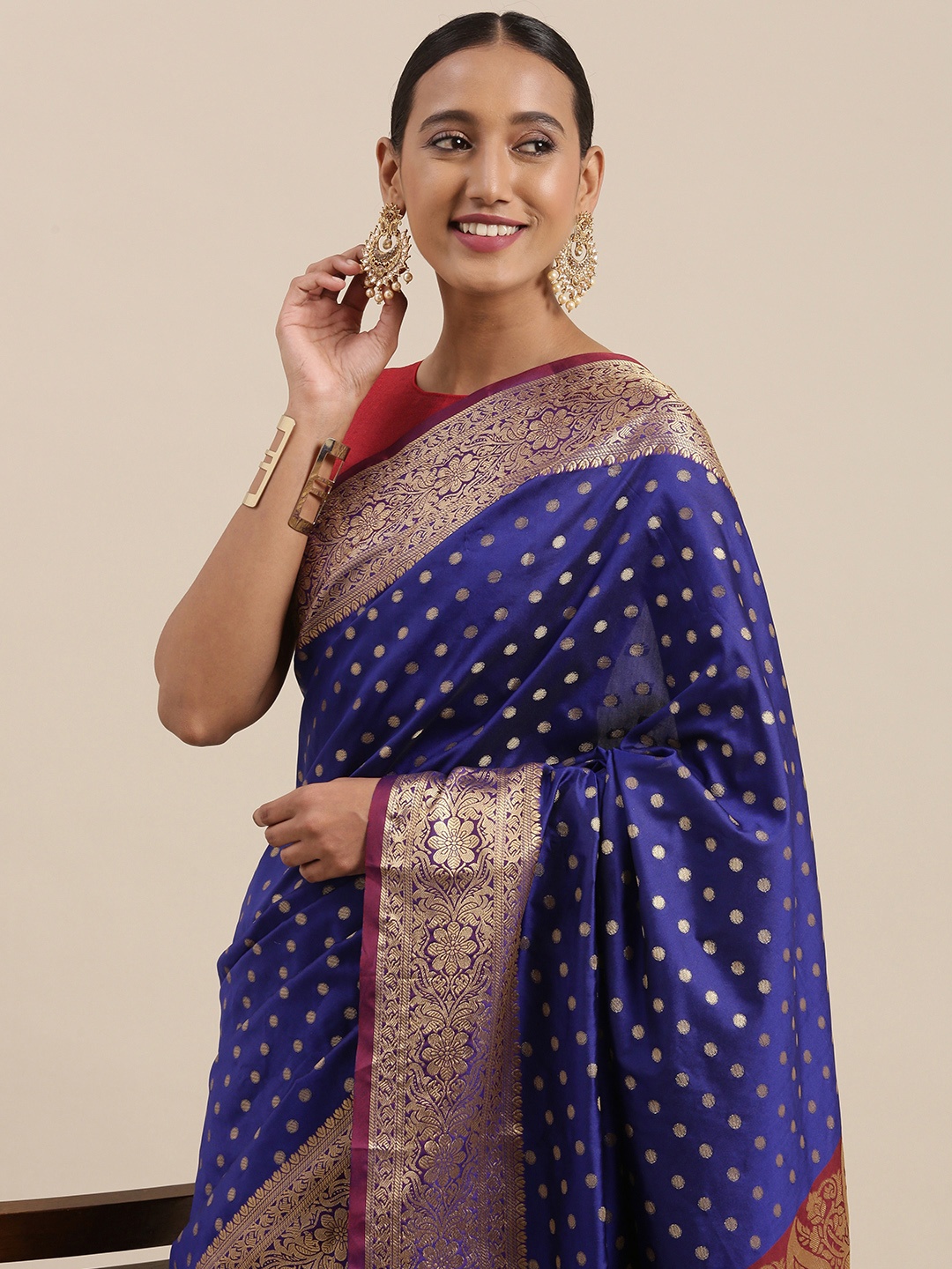 

Mitera Blue & Golden Ethnic Motifs Banarasi Saree