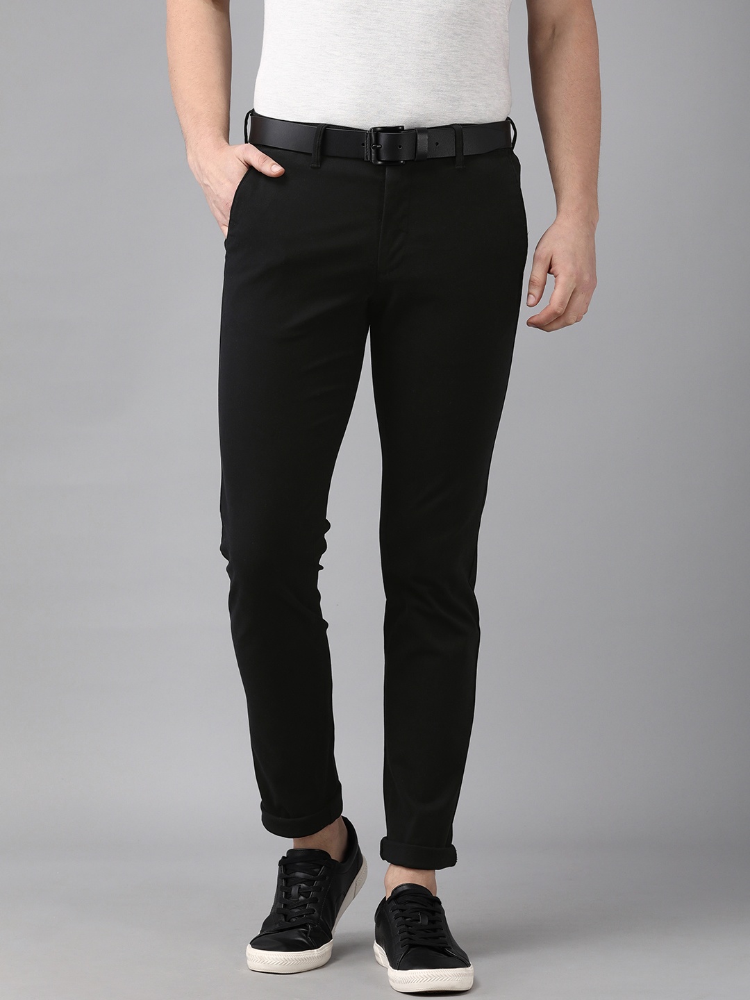 

Van Heusen Sport Men Black Tapered Fit Mid-Rise Regular Trousers