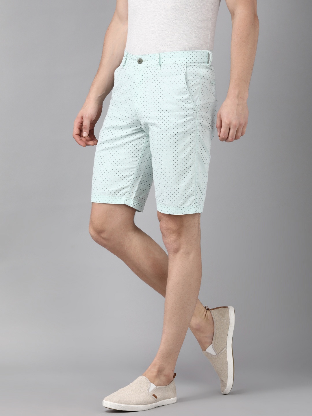 

Van Heusen Sport Men Turquoise Blue Conversational Printed Regular Shorts