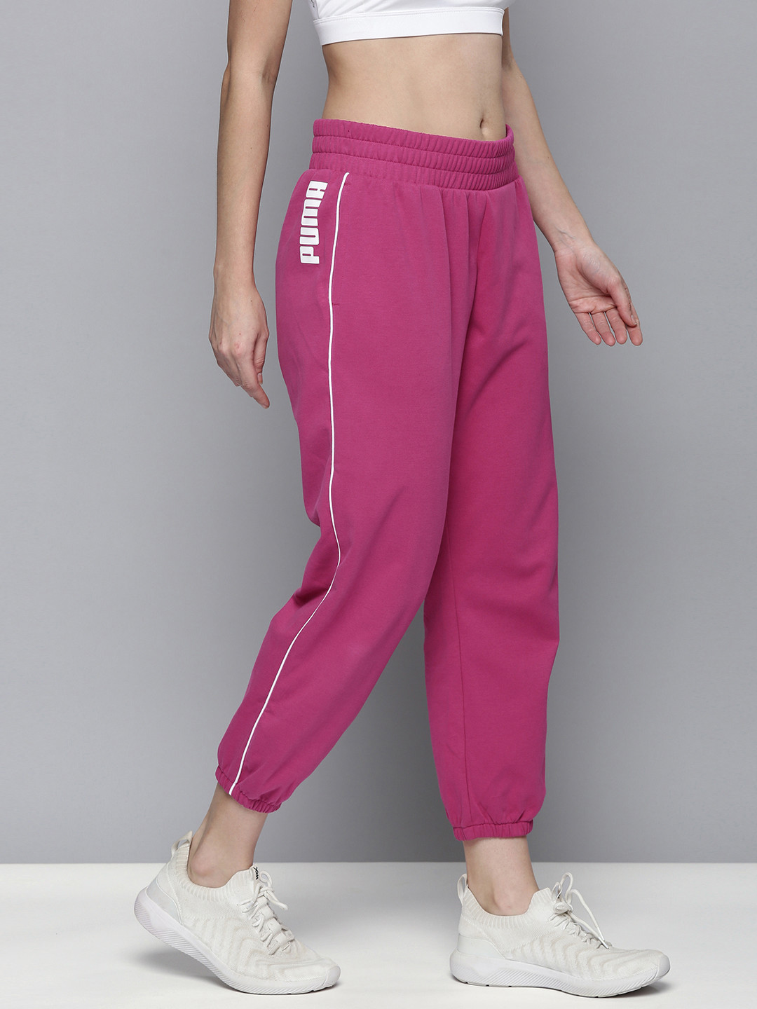

Puma Women Festival Fuchsia Pink Knitted Mid-Rise dryCELL Technology Modern Sports Sustainable Joggers