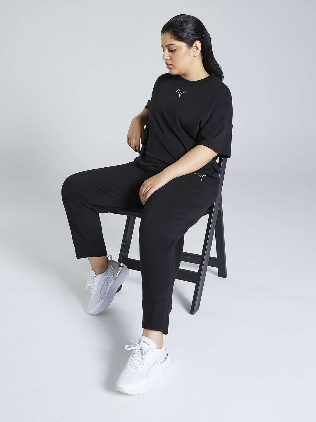 

PUMA Women Black Brand Logo Printed High-Rise Sustainable Track Pants