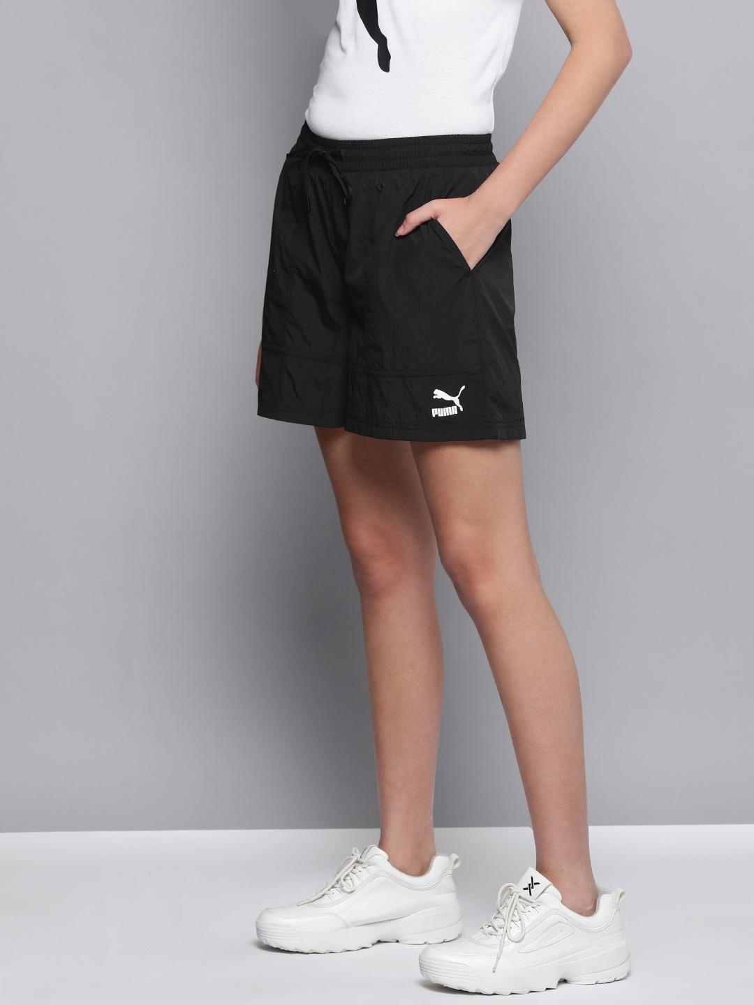 

Puma Women Black Solid Relaxed Fit High-Rise Woven Nylon Regular Shorts