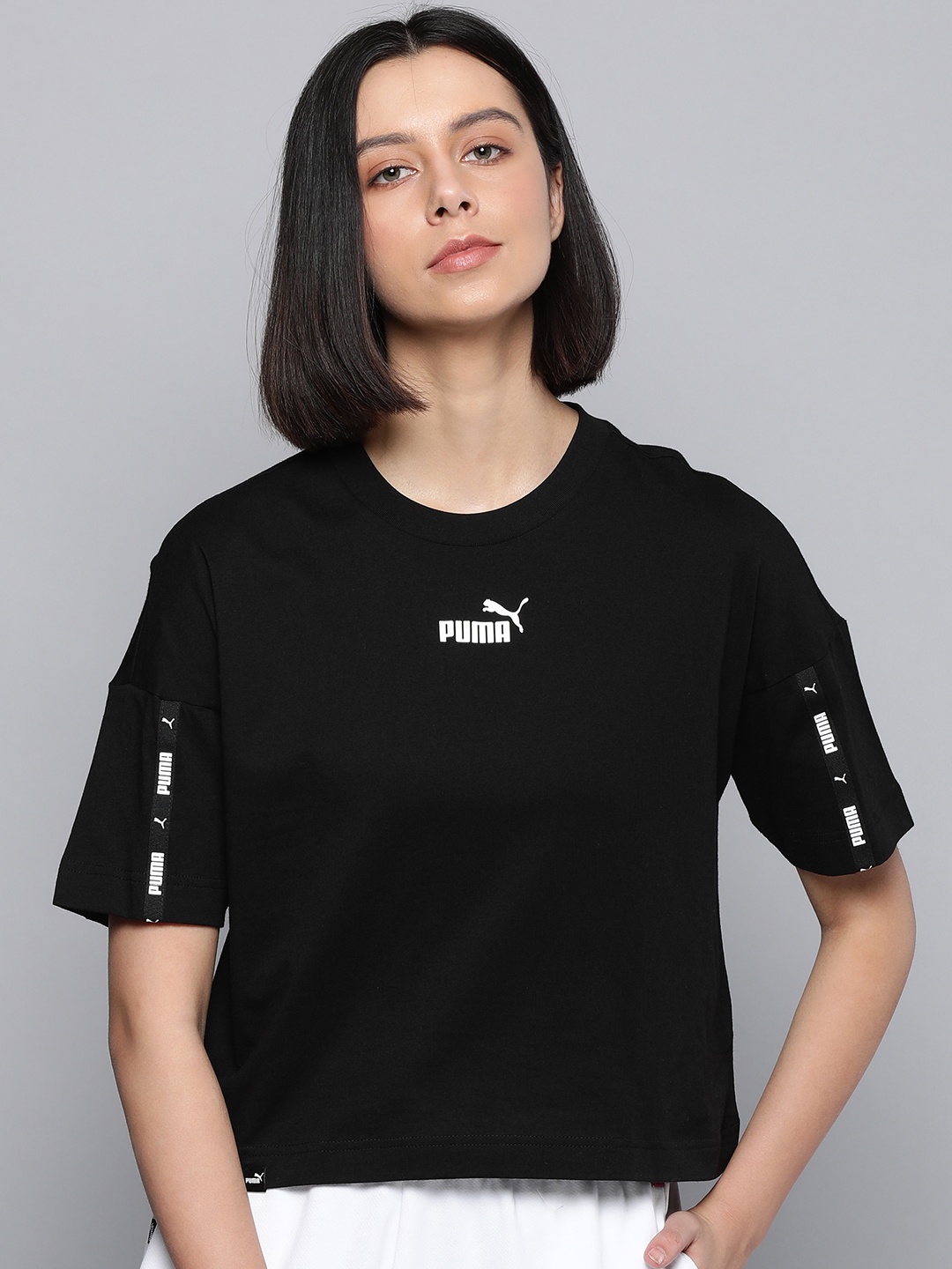 

Puma Relaxed Fit Brand Logo Print Extended Sleeves Tank Crop Top, Black