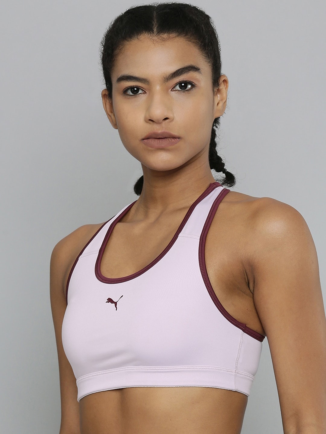 

Puma Women White & Purple PrintedMid Impact Lightly Padded Training Sustainable Bra