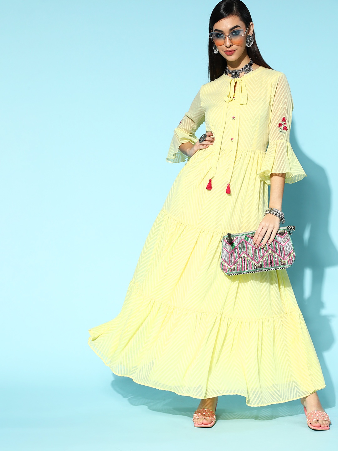 

Inddus Yellow Solid Tie-Up Neck Chiffon Maxi Dress