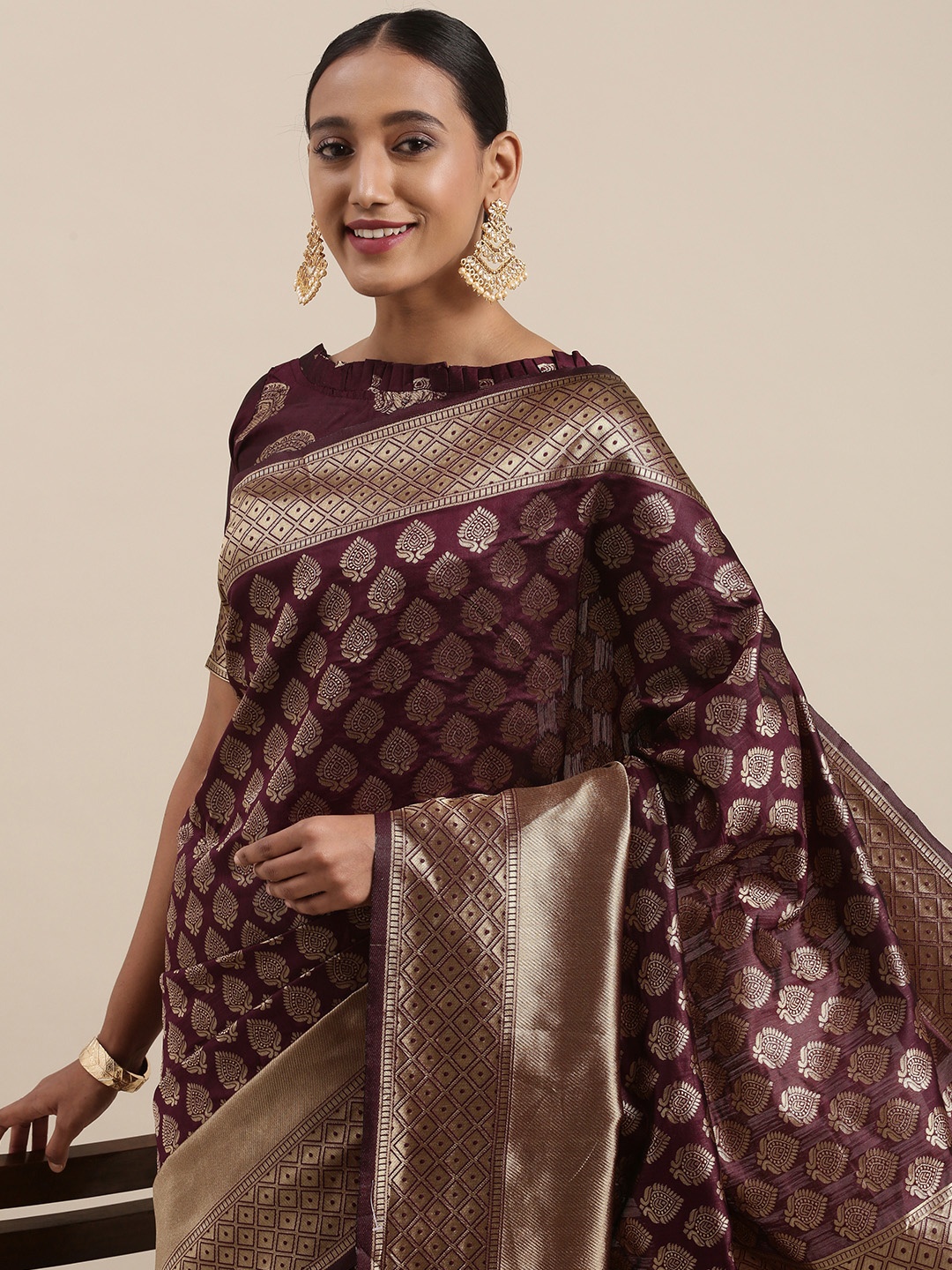 

Mitera Burgundy & Golden Ethnic Motifs Woven Design Saree
