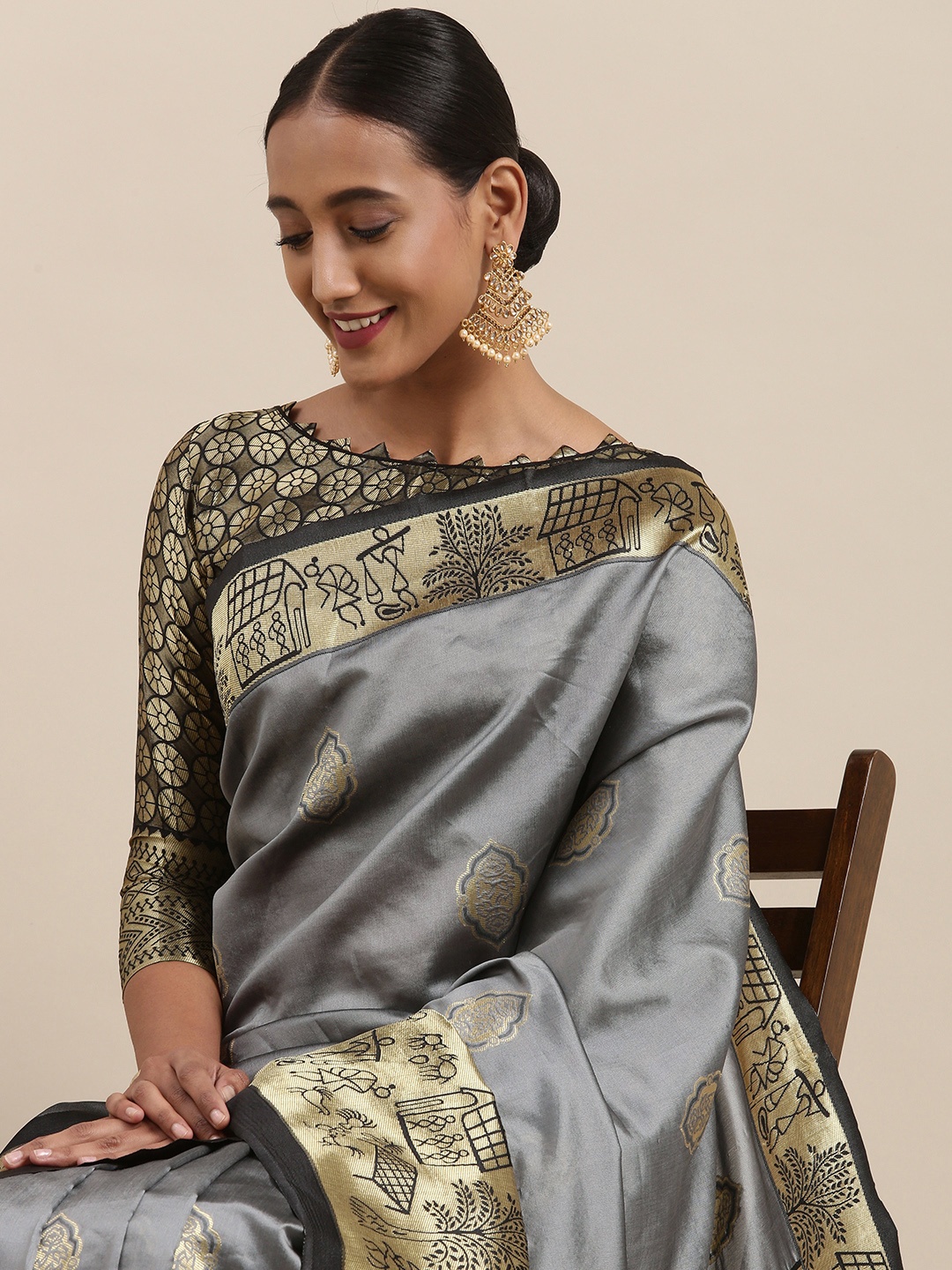 

Mitera Grey & Golden Ethnic Motifs Woven Design Saree