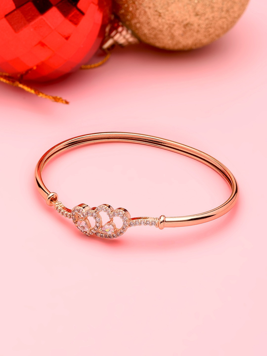 

Zaveri Pearls Women Rose Gold Plated Brass Cubic Zirconia Heart Design Kada Style Bracelet