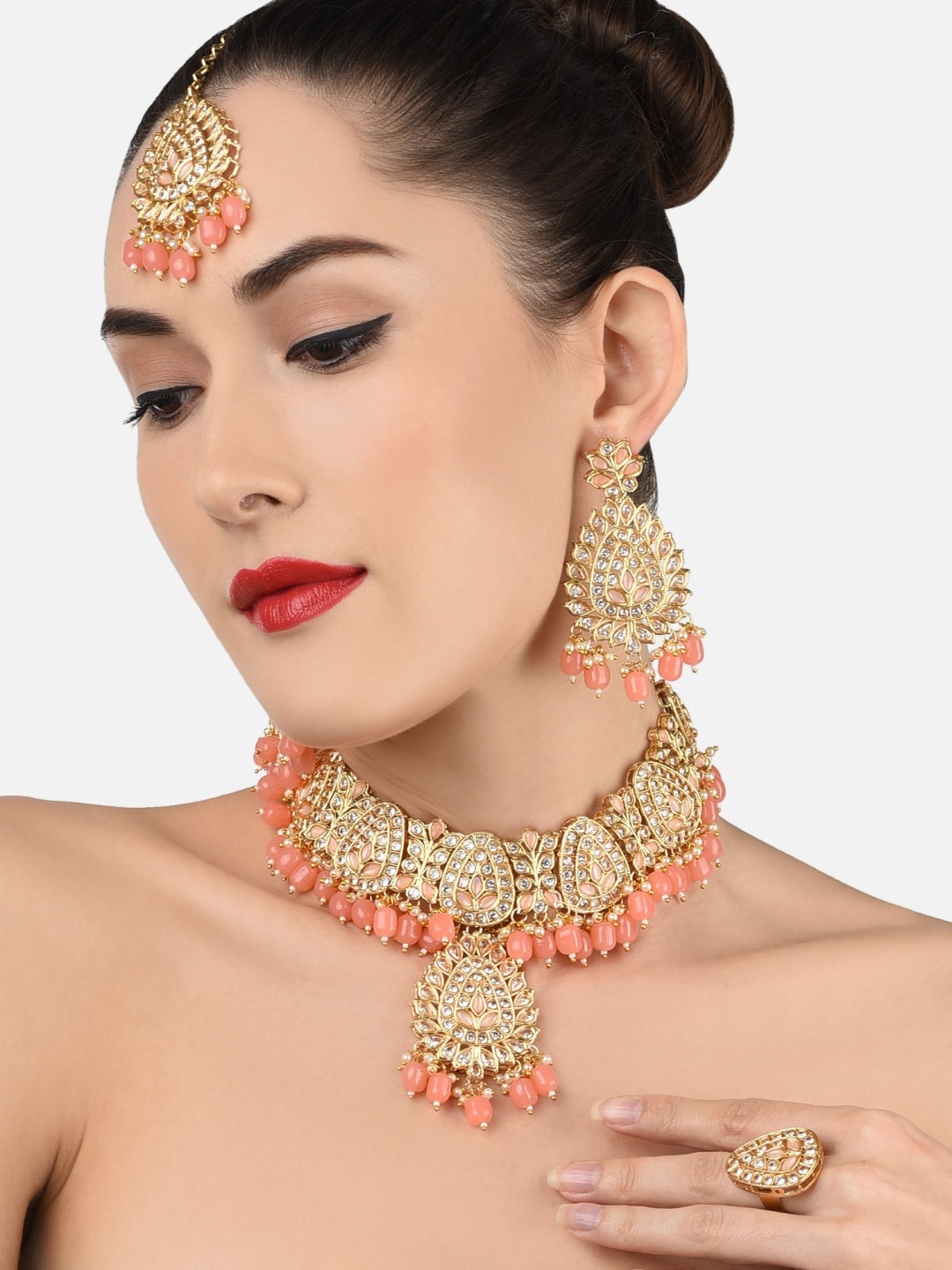 

Zaveri Pearls Gold-Plated White & Peach Kundan Studded & Beaded Jewellery Set