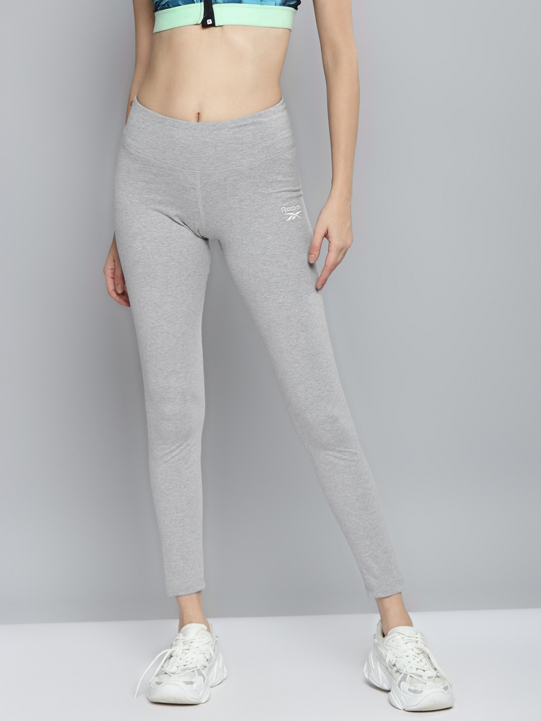 

Reebok Women Grey Melange Solid Training Tights