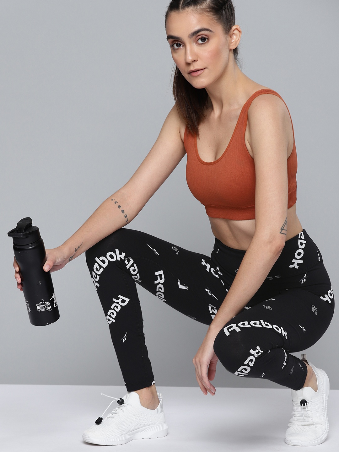 

Reebok Women Black & White Cotton AOP Brand Logo Training Tights