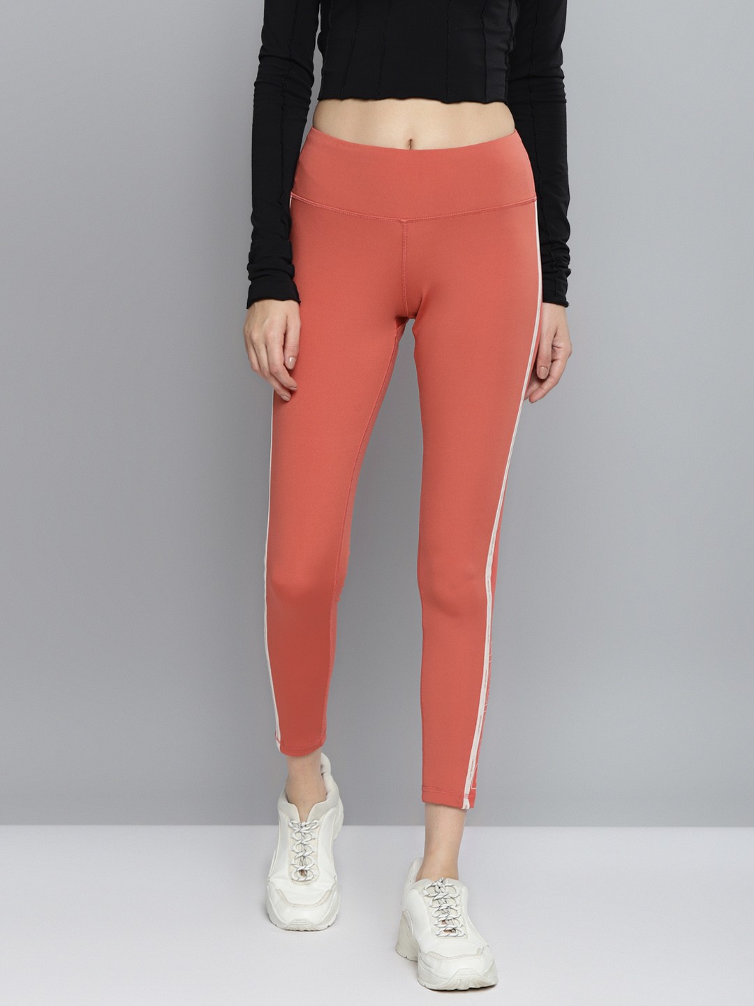 

Reebok Women Coral Orange Piping Training High-Rise Tights