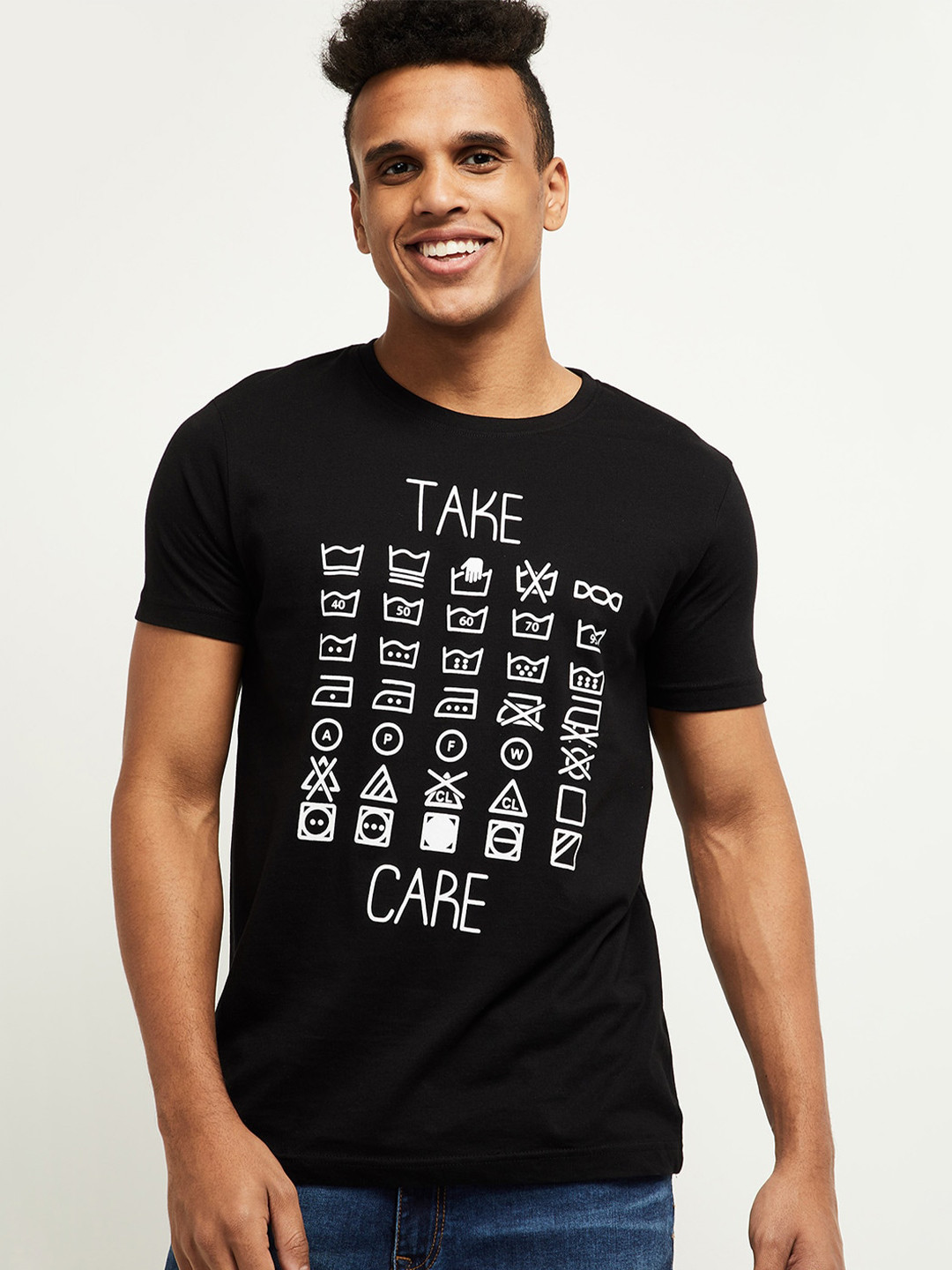 

max Men Black Typography Printed T-shirt