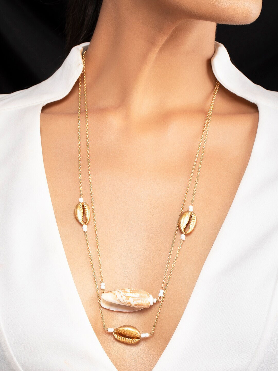 

Rubans Voguish Gold-Toned & White Tessel with Shell Layered Necklace