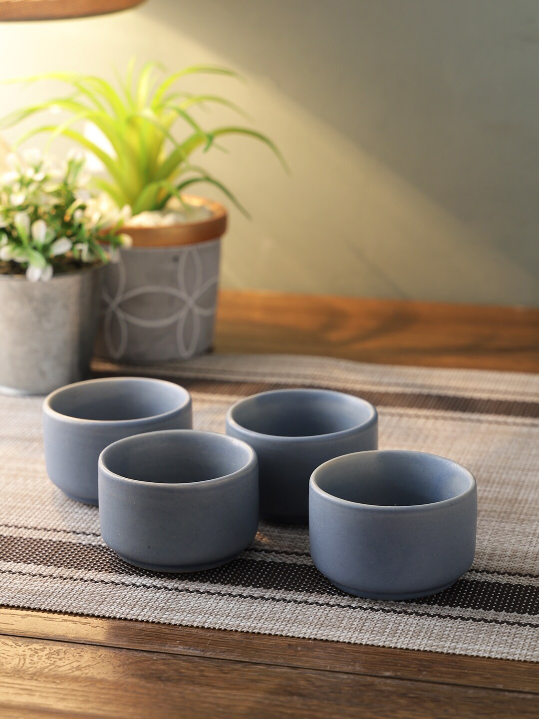 

Aapno Rajasthan Set Of 4 Blue Solid Ceramic Dip Bowls