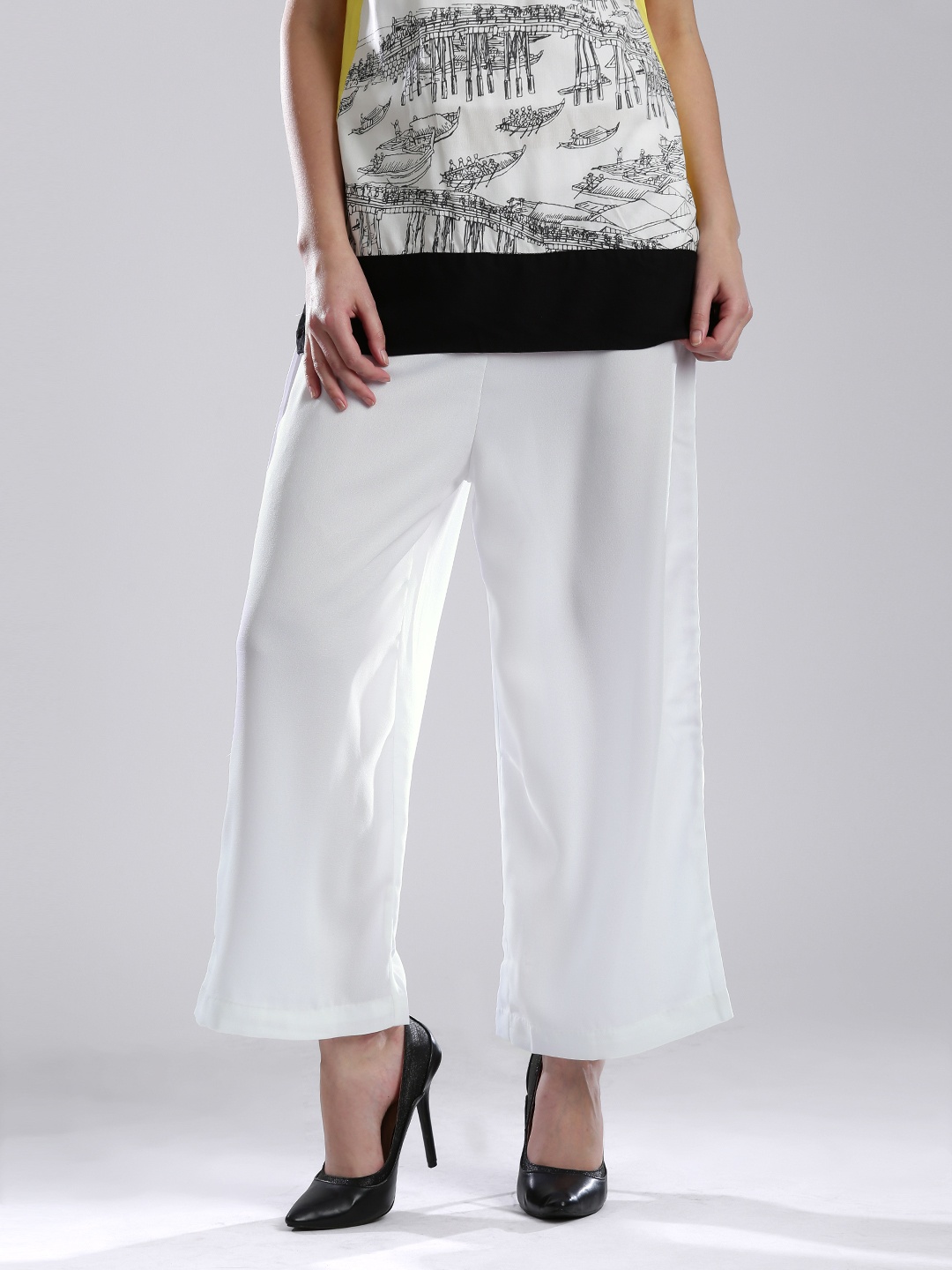 

W Women White Solid Palazzo Trousers