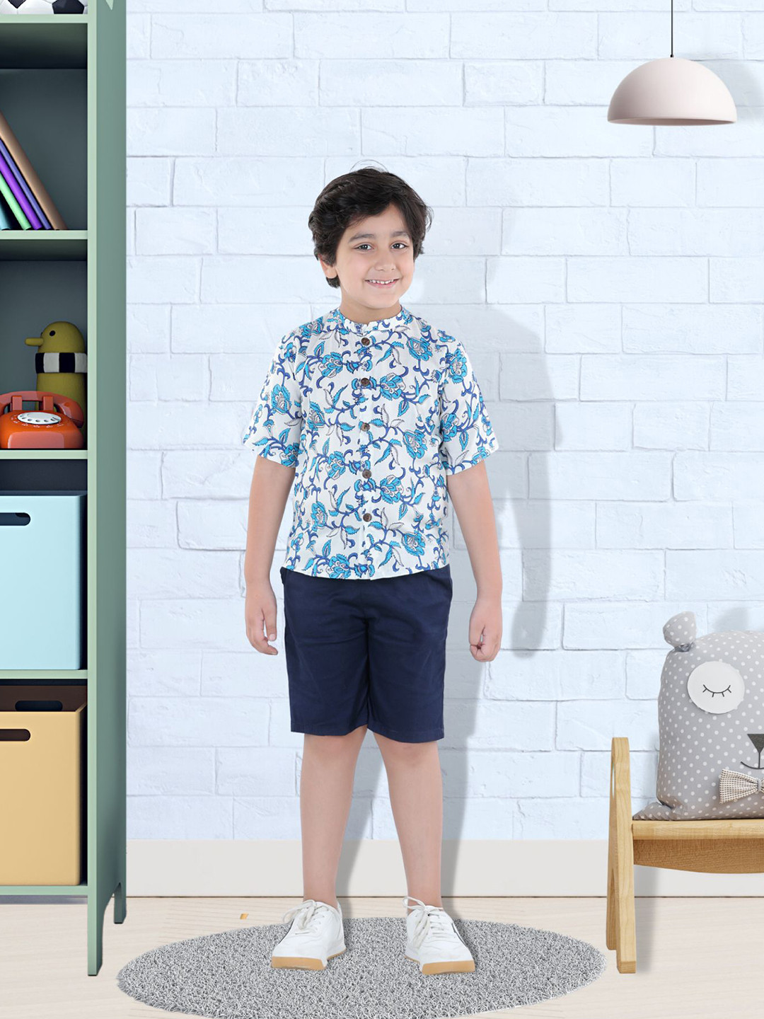 

Cutiekins Boys Turquoise Blue Printed Shirt with Shorts