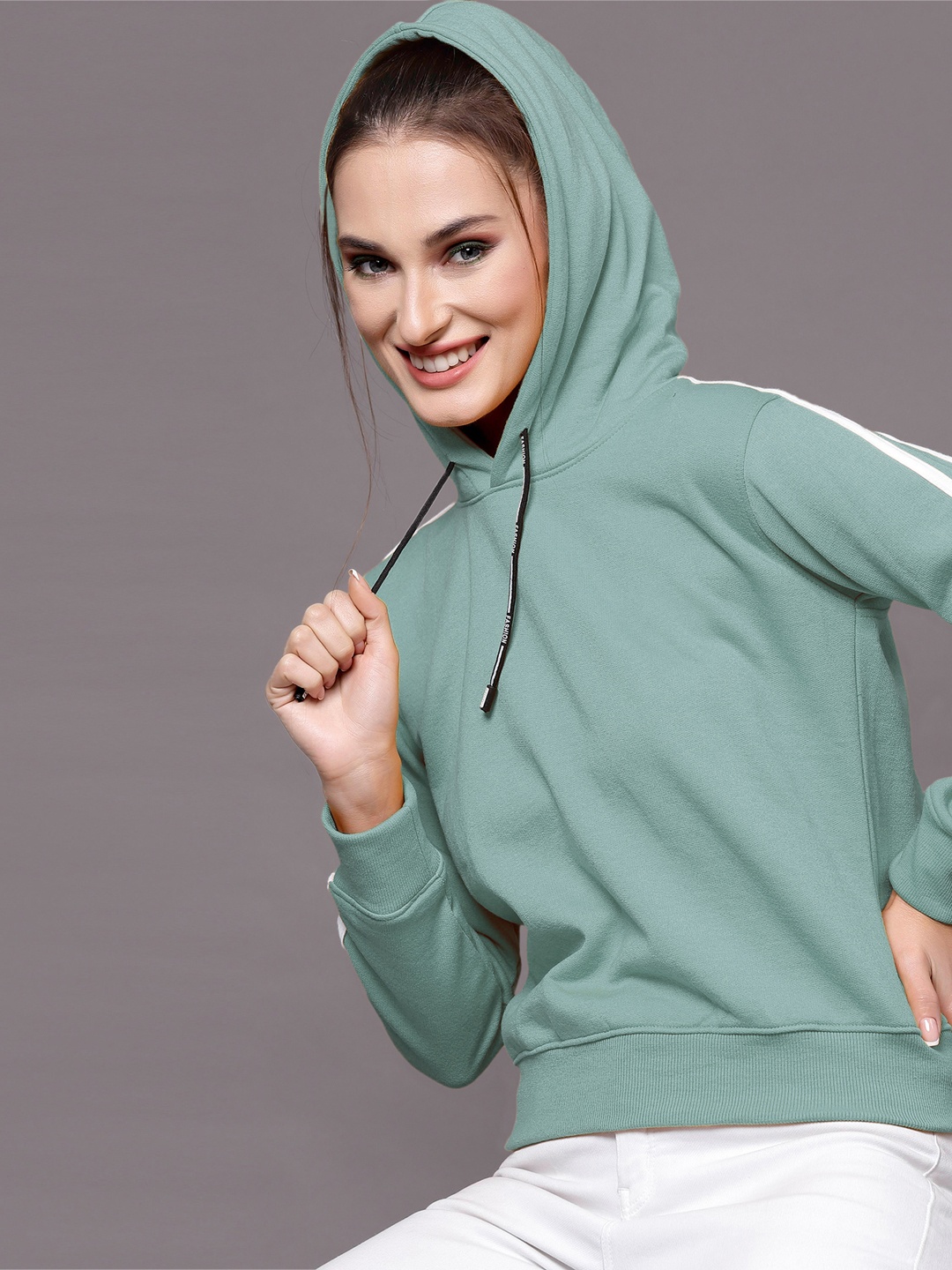 

Selvia Women Green Hooded Sweatshirt