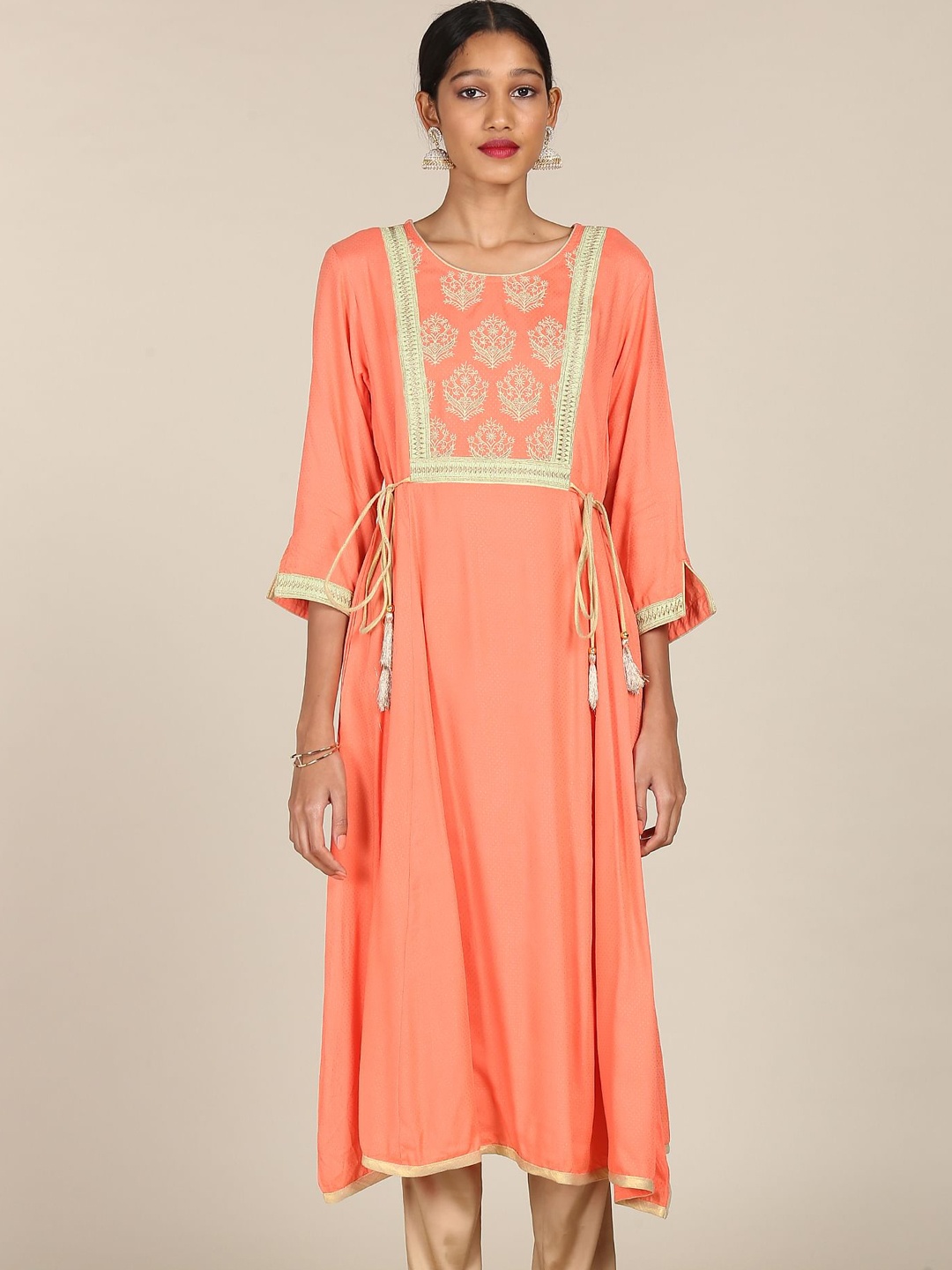 

Anahi Women Orange Ethnic Motifs Embroidered Yoke Design Kurta