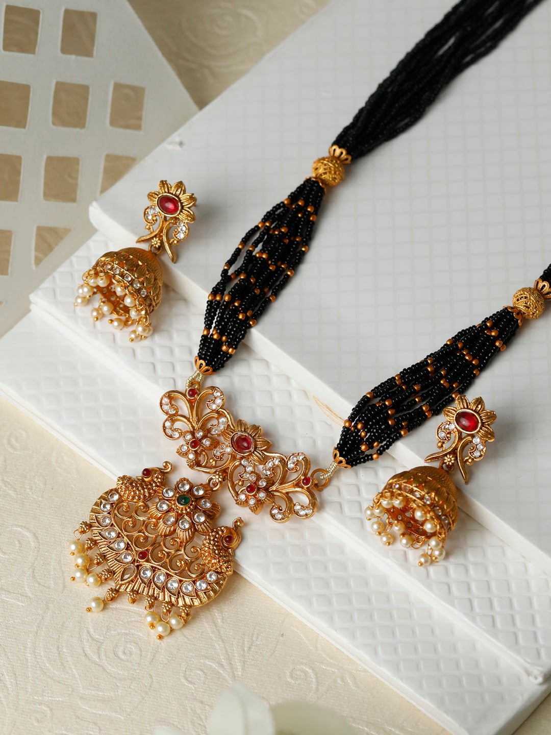 

Priyaasi Gold-Toned & Black Traditional Real Kemp Mangalsutra Set