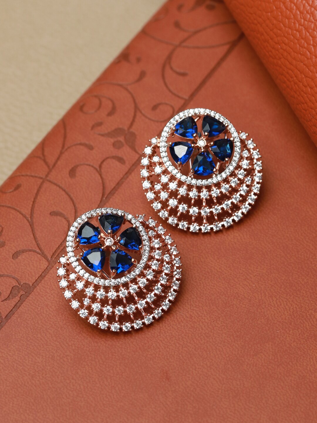 

Priyaasi Rose Gold & Blue Floral AD Studded Studs Earrings