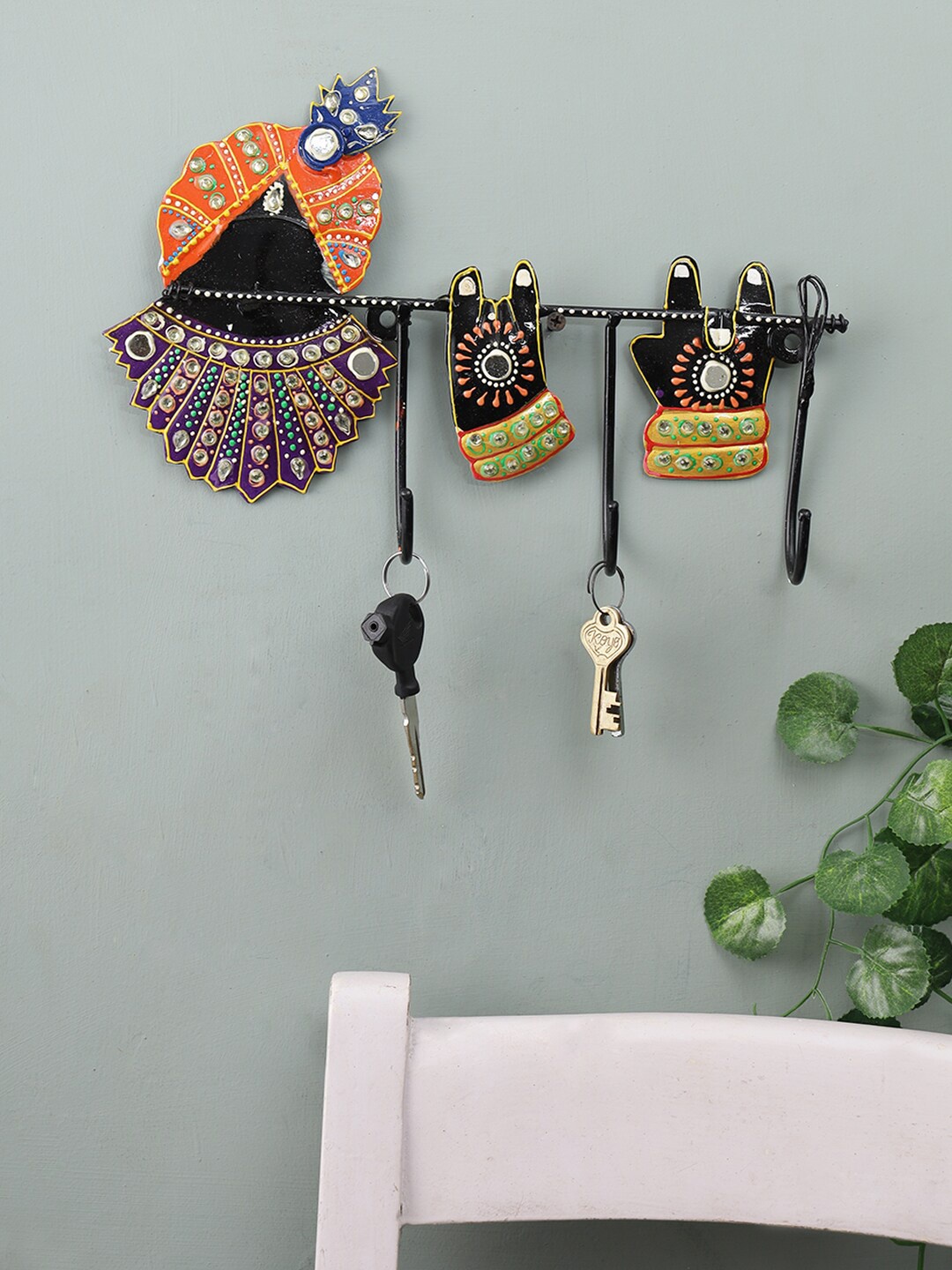 

Aapno Rajasthan Orange & Black Lord Krishna Key Holder