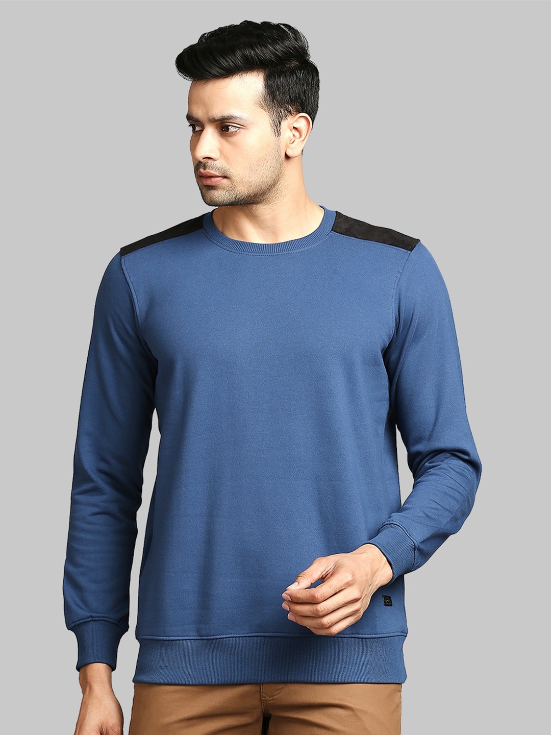 

Parx Men Blue Solid Sweatshirt