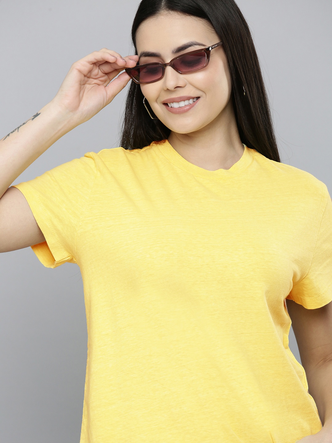 

Levis Women Yellow Solid Pure Cotton T-shirt