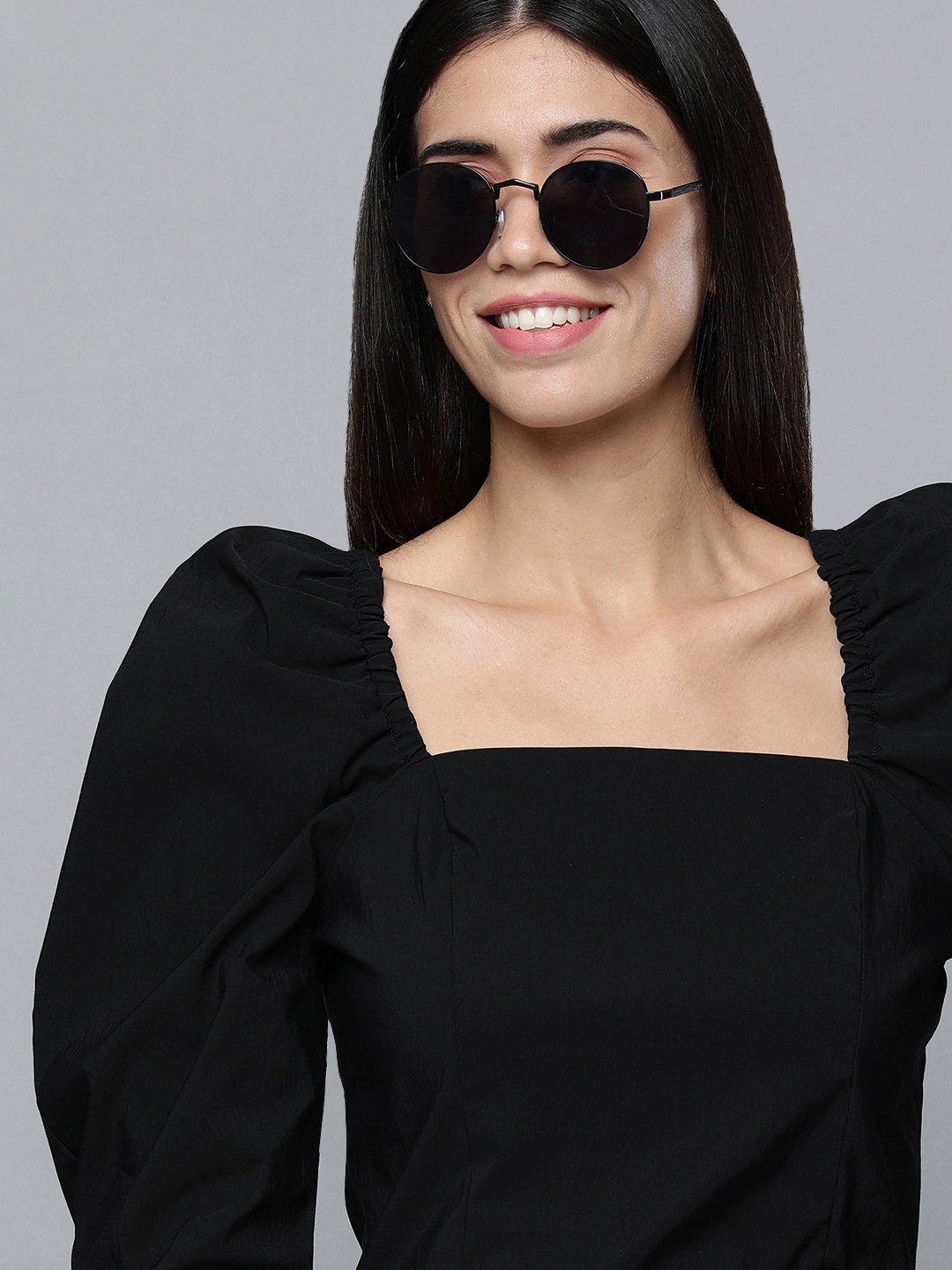

Levis Women Black Solid Square Neck Smocked Puff Long Sleeves Blouson Top