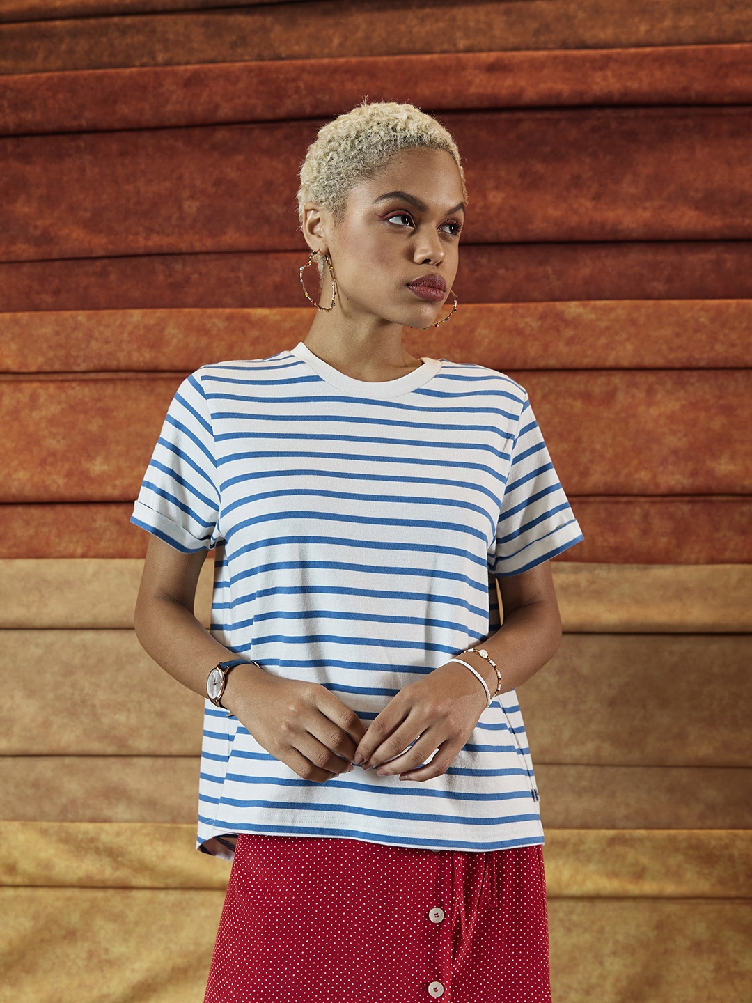 

Levis Women White & Blue Striped Pure Cotton Casual T-shirt
