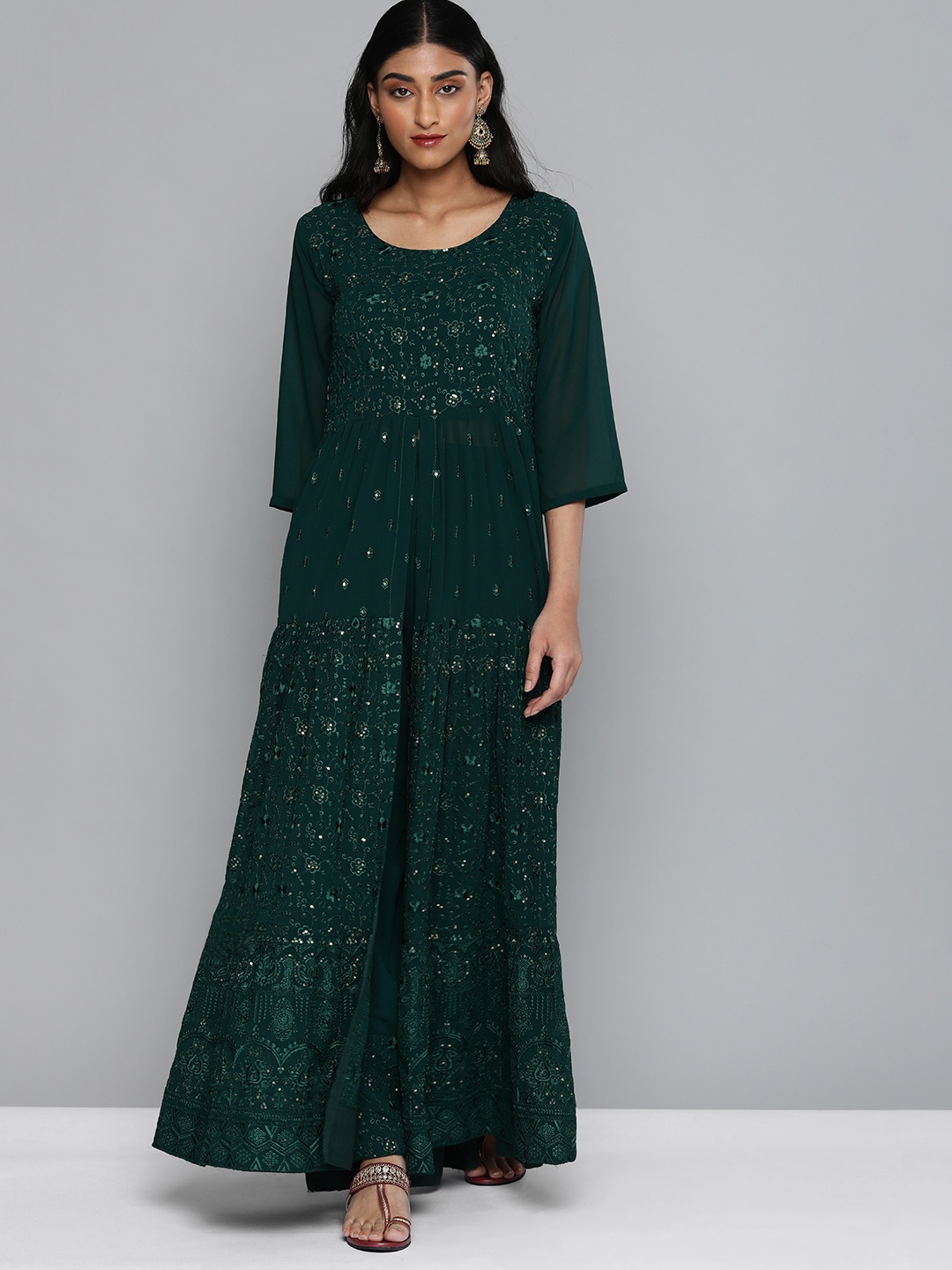 

Kvsfab Women Green Embroidered Sequinned Kurta with Trousers