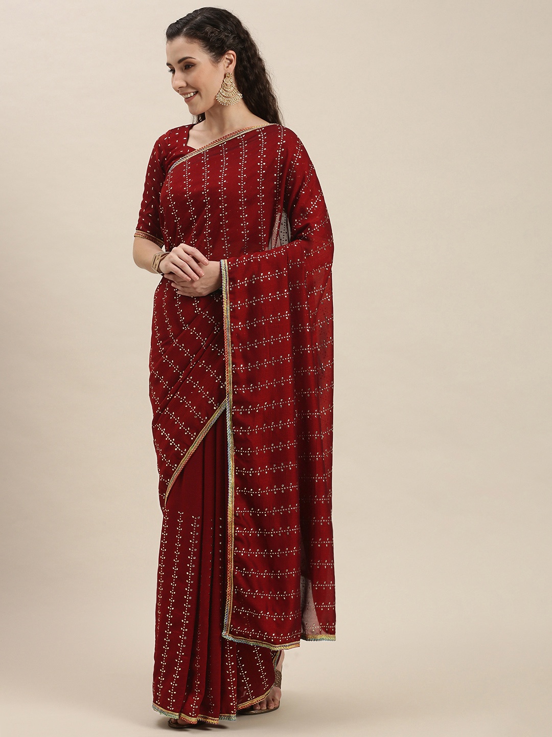 

Amrutam Fab Red & Silver-Toned Beads and Stones Emrbroidered Art Silk Saree