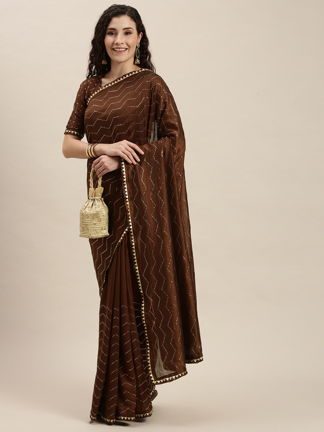 

Amrutam Fab Brown & Gold-Toned Beads and Stones Embroidered Art Silk Saree