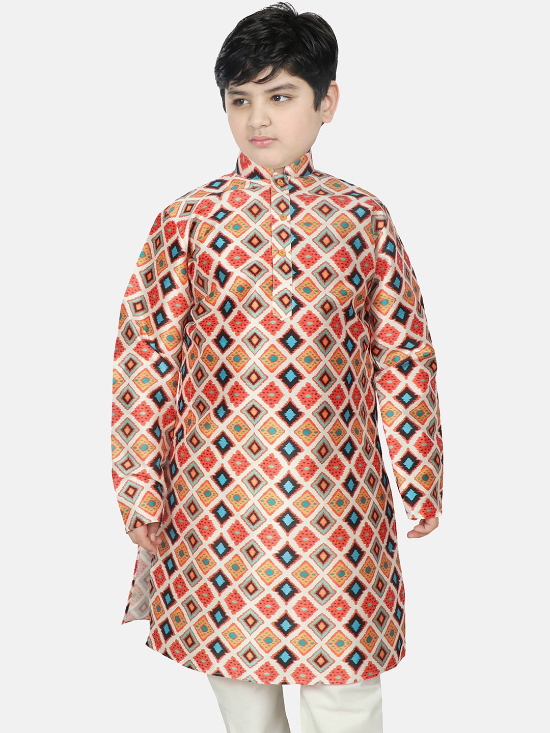 

SG YUVRAJ Boys Cream-Coloured & Orange Geometric Printed Raw Silk Kurta