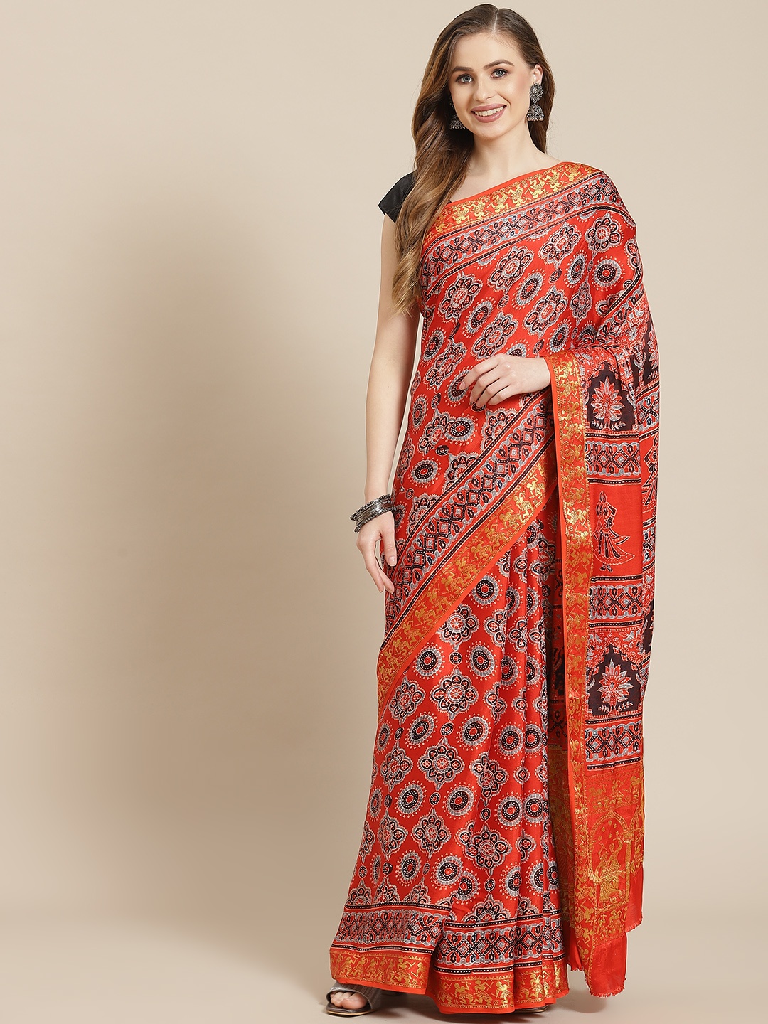 

ADITRI Orange & Brown Ajrakh Print Zari Modal Silk Block Print Saree