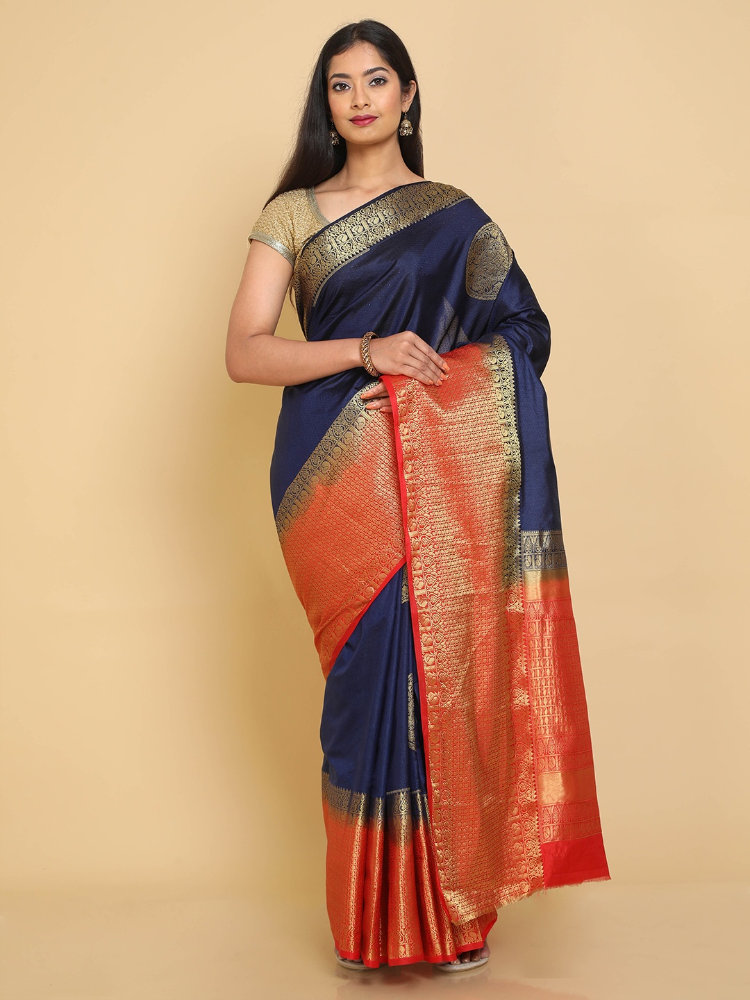 

Kalamandir Navy Blue & Orange Ethnic Motifs Zari Silk Blend Banarasi Saree
