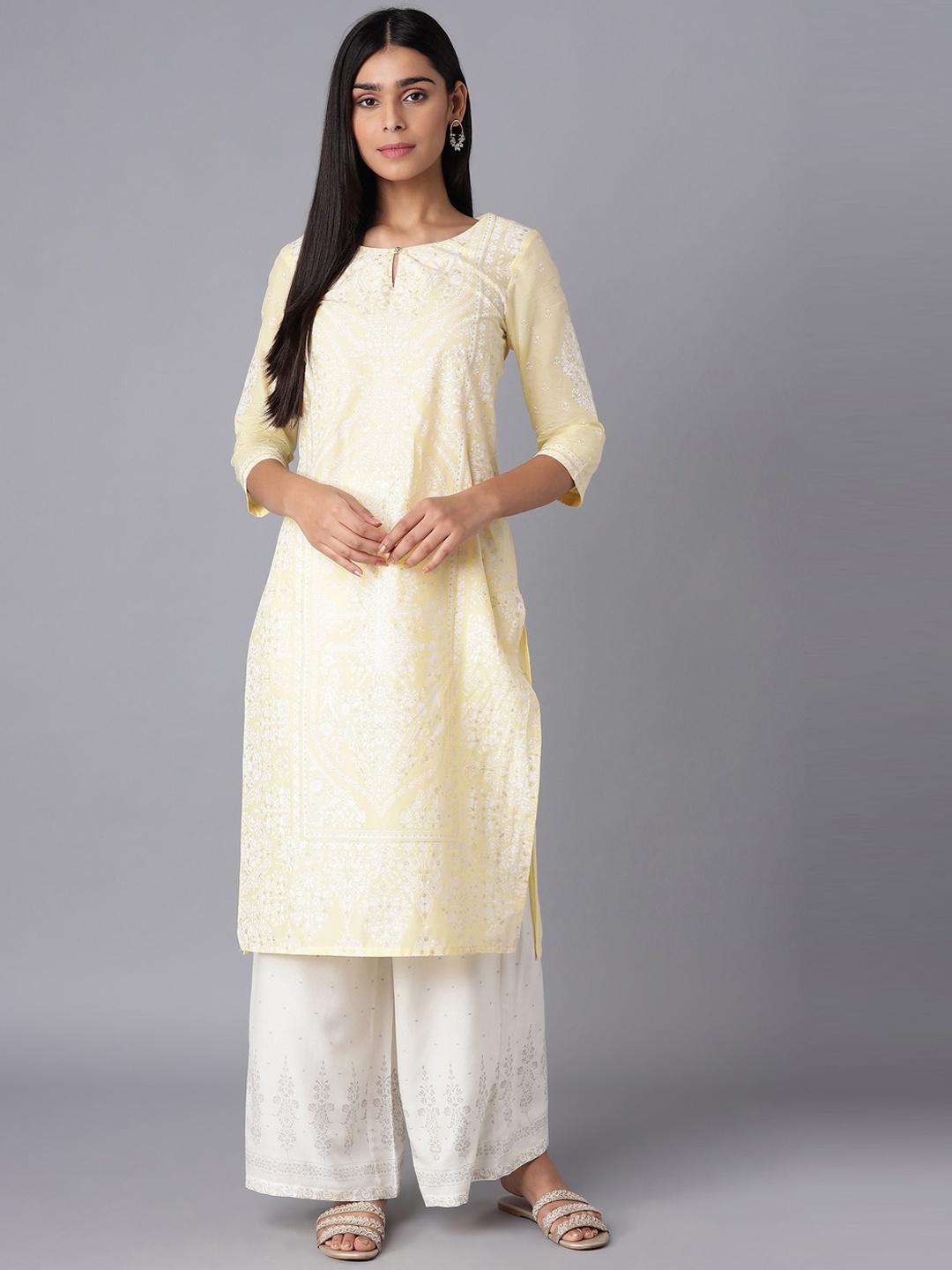 

W Women Yellow Ethnic Motifs Thread Work Kurta