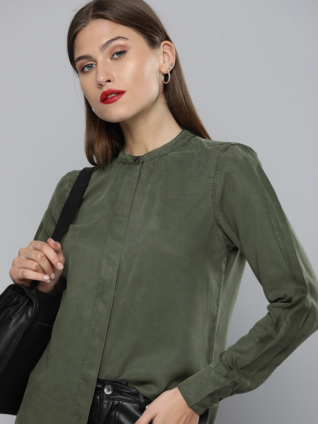 

Levis Women Olive Green Solid Stand-Collar Casual Shirt