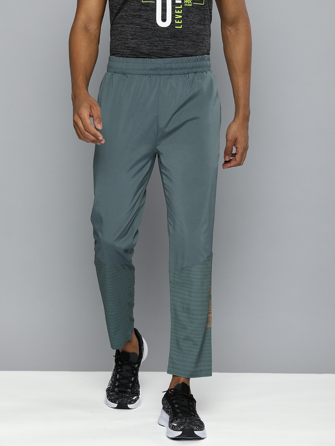 

HRX by Hrithik Roshan Men Teal Blue Slim Fit Self-Design Training Track Pants