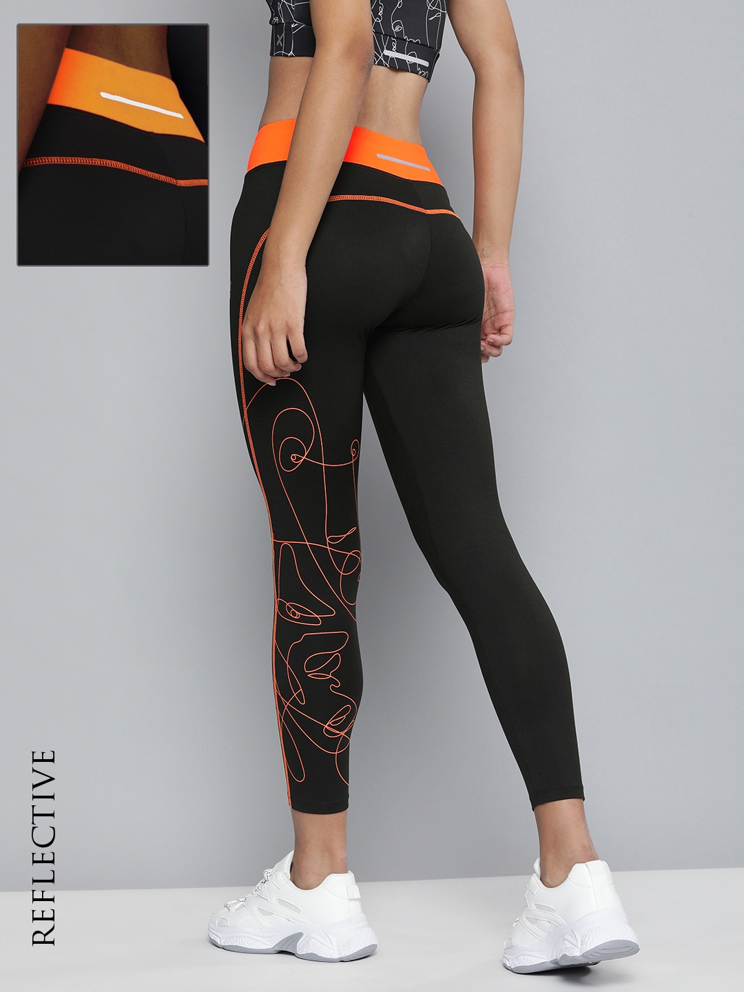 

HRX by Hrithik Roshan Running Women Neon Orange Rapid-Dry AOP Tights, Black