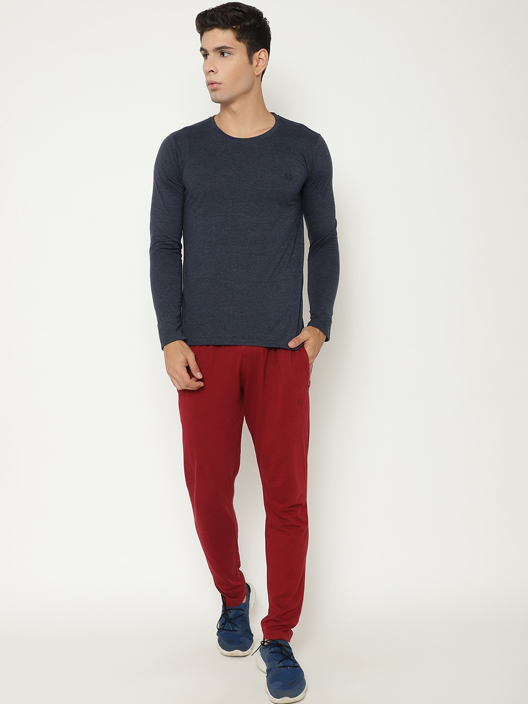 

Chkokko Men Blue & Maroon Solid Track Suit