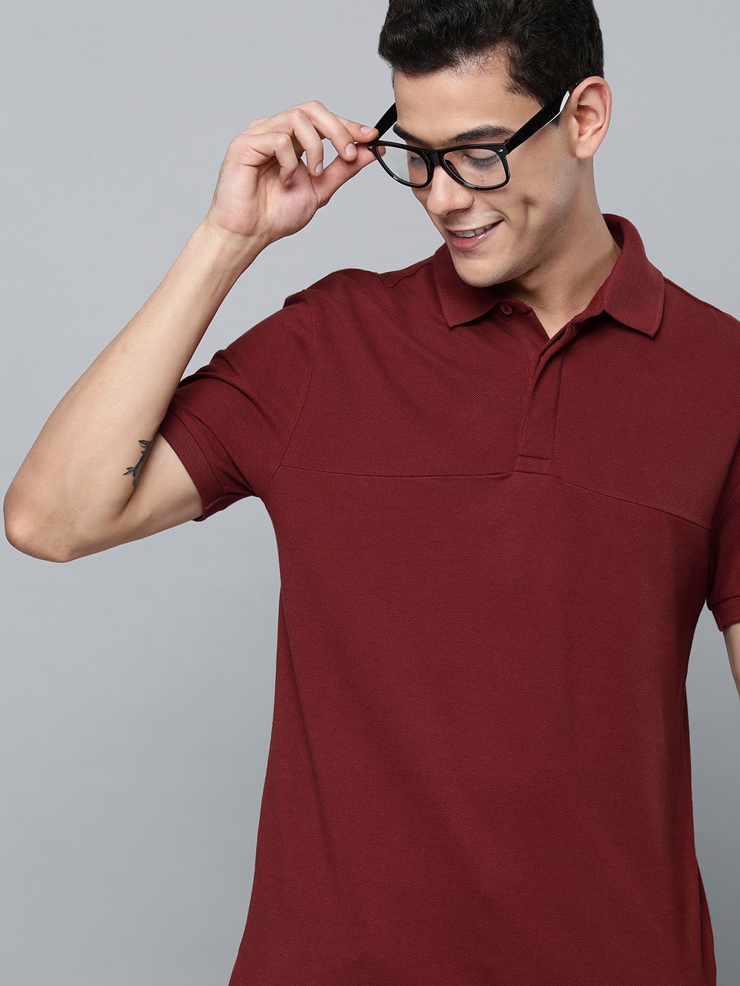 

Levis Men Maroon Solid Polo Collar Regular Sleeves Pure Cotton Regular Fit T-shirt