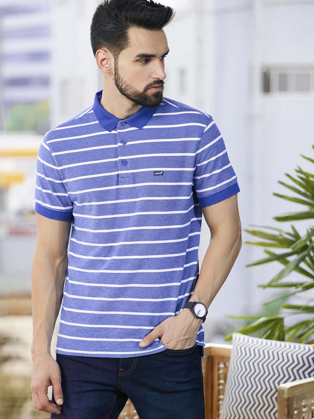 

Levis Men Blue & White Striped Polo Collar Pure Cotton T-shirt