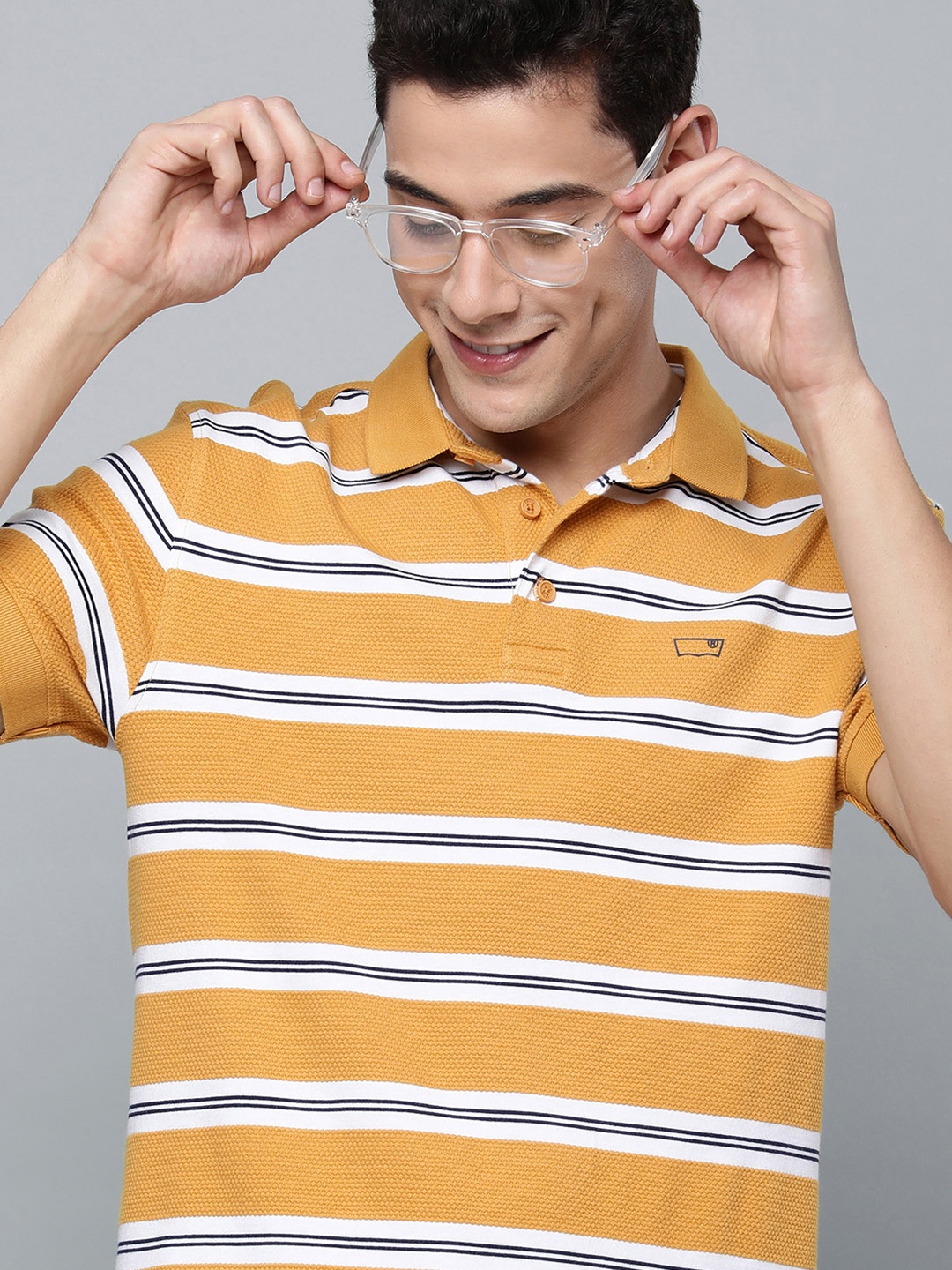 

Levis Men Yellow & Black Striped Polo Collar Pure Cotton T-shirt